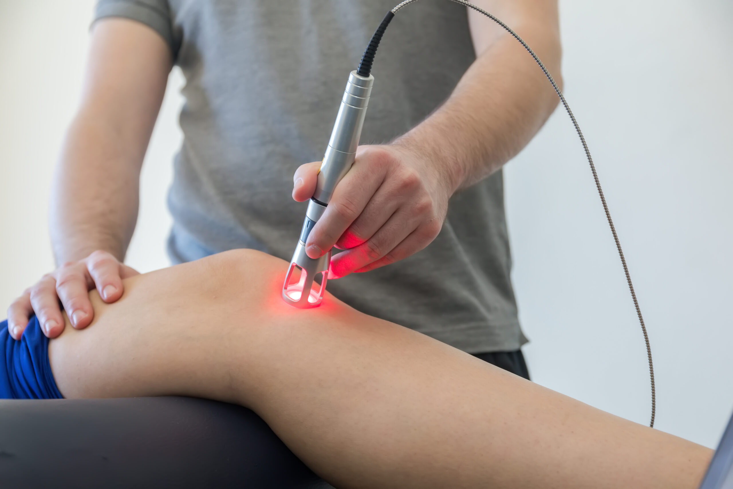 Laser,Therapy,On,A,Knee,Used,To,Treat,Pain.,Selective